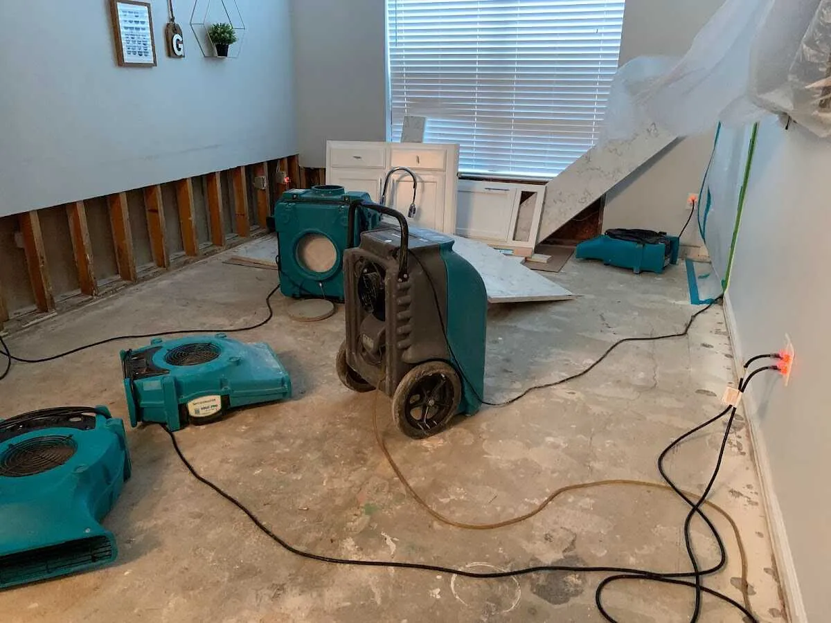 Dehumidifier in flood-cut room for Water Damage Restoration in Henderson